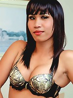 Buxom ladyboy babe unloads her tranny sack